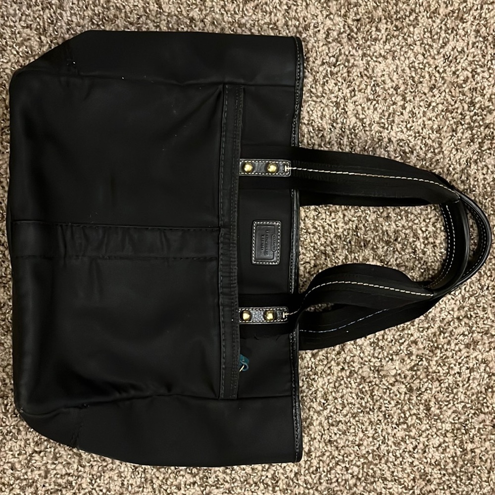 Black Coach Purse used but in good condition.